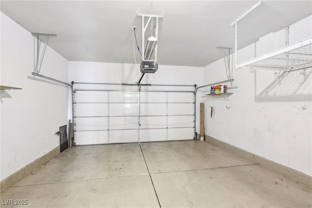 garage featuring a garage door opener