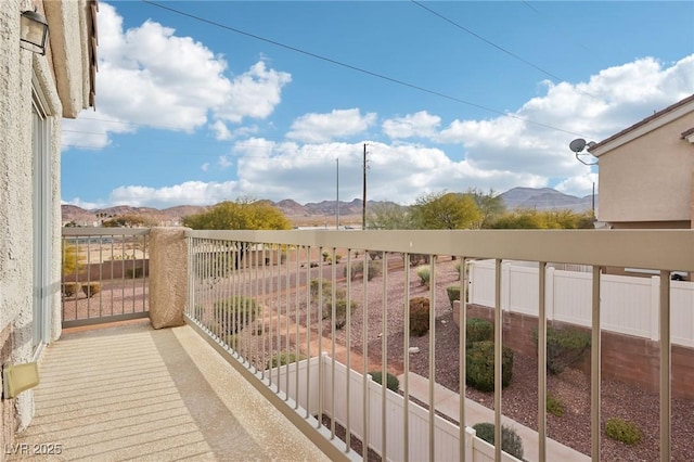 balcony featuring a mountain view