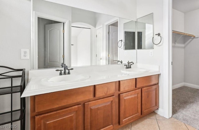 bathroom featuring tile patterned floors and vanity