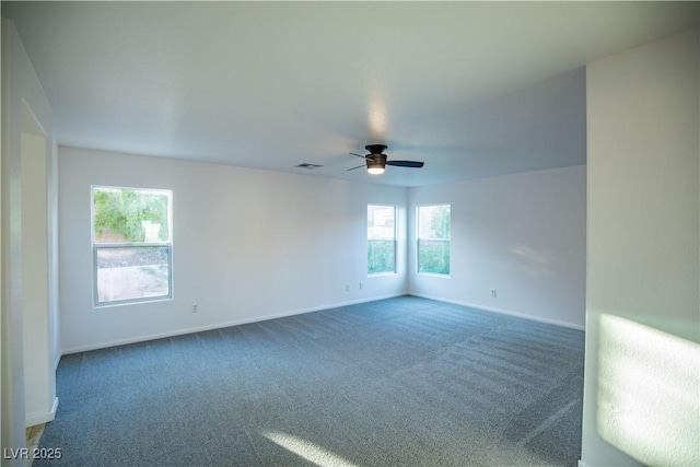 carpeted empty room with ceiling fan