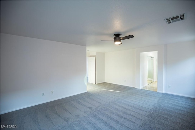 unfurnished room featuring carpet flooring and ceiling fan