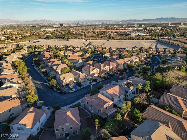 bird's eye view with a mountain view