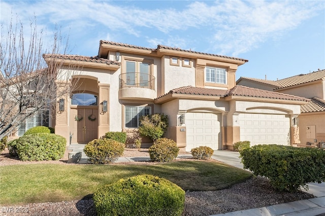 mediterranean / spanish-style home featuring a balcony and a garage