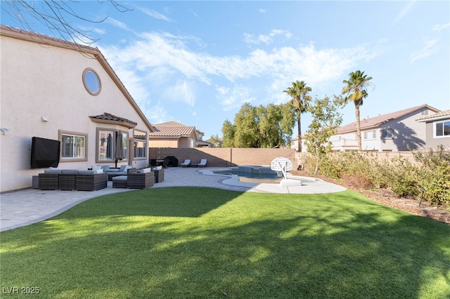 view of yard with outdoor lounge area, a hot tub, and a patio area