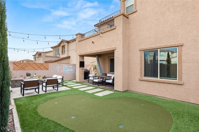 view of community featuring a patio area