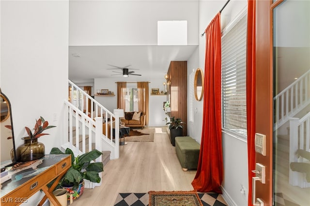 entrance foyer featuring ceiling fan and light hardwood / wood-style flooring