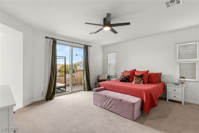 bedroom featuring access to outside, ceiling fan, and light colored carpet