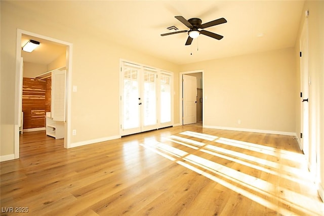 unfurnished bedroom featuring ceiling fan, connected bathroom, and light hardwood / wood-style floors