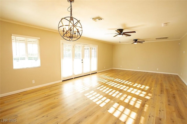 empty room featuring ornamental molding, ceiling fan with notable chandelier, and light hardwood / wood-style flooring