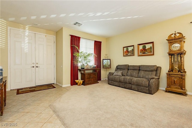 living room with light tile patterned floors