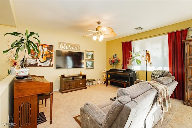 living room with ceiling fan