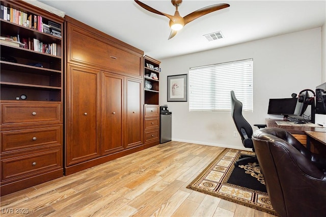 office area featuring light hardwood / wood-style floors and ceiling fan