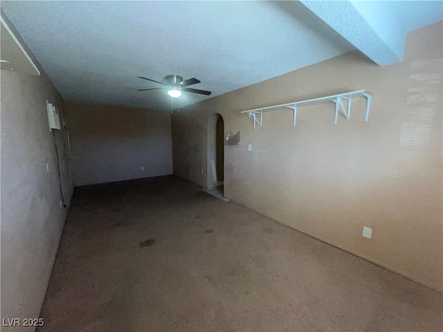 interior space featuring ceiling fan