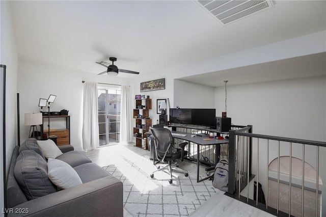 office area with ceiling fan and light wood-type flooring