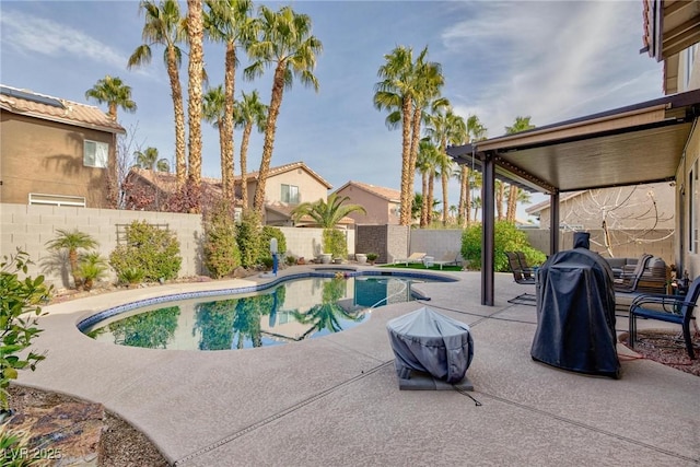 view of swimming pool featuring a patio area