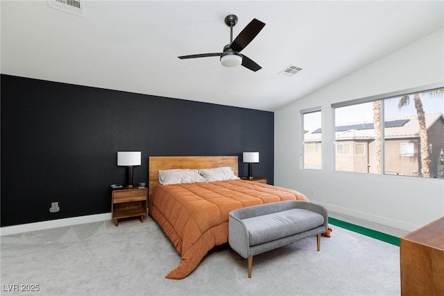 bedroom featuring light colored carpet, ceiling fan, and lofted ceiling