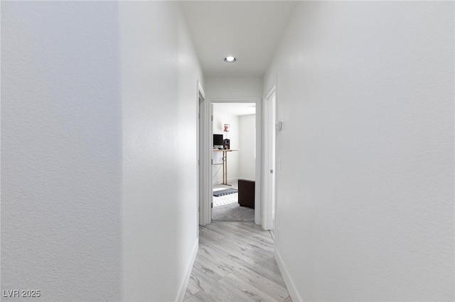 hallway featuring light hardwood / wood-style flooring