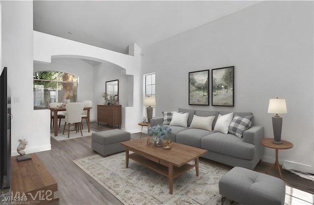 living room with light hardwood / wood-style flooring