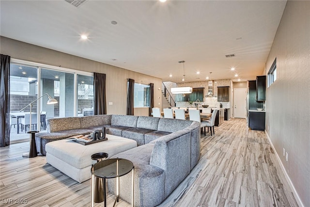 living room with light wood-type flooring