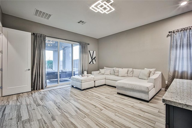 unfurnished living room with light hardwood / wood-style floors