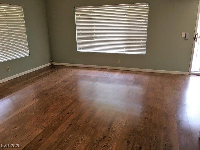 spare room featuring hardwood / wood-style floors