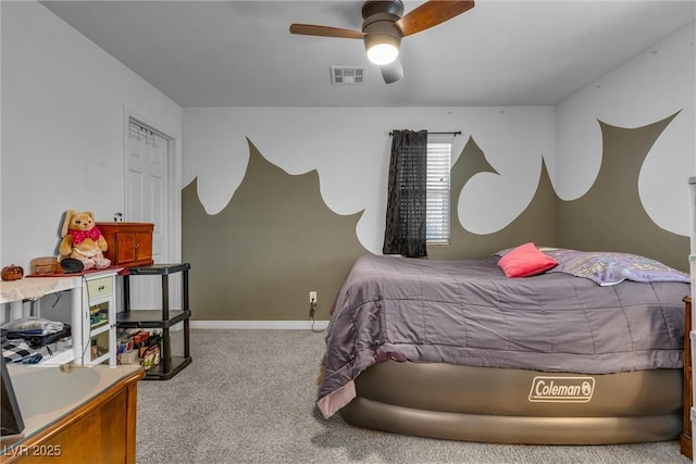 bedroom featuring ceiling fan and light colored carpet