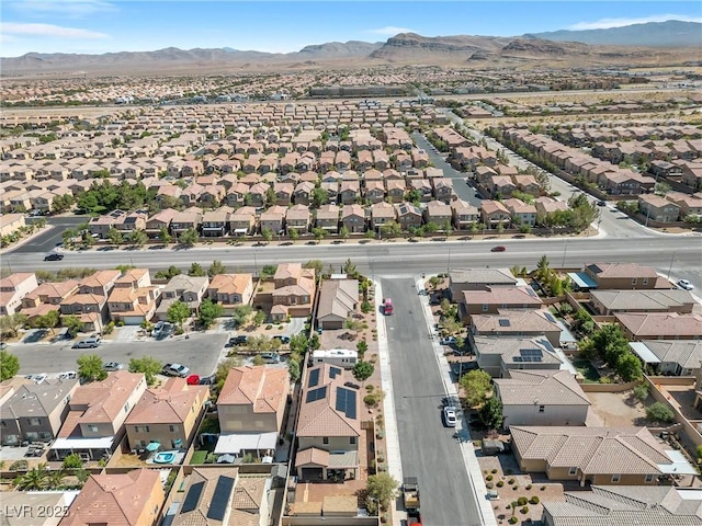 drone / aerial view featuring a mountain view