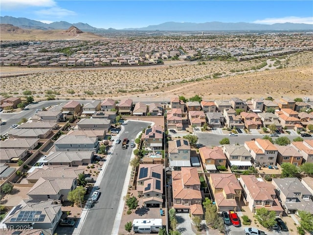 bird's eye view with a mountain view