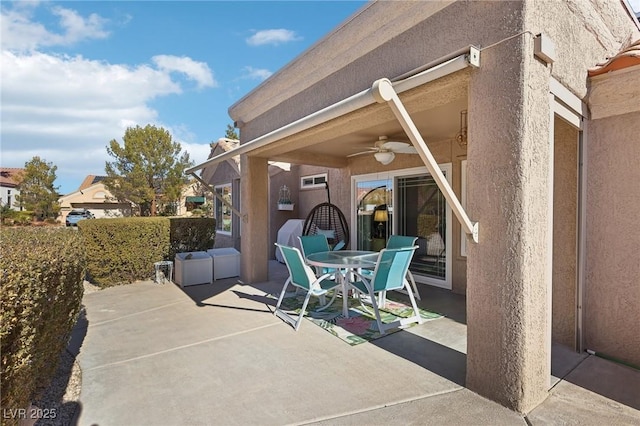 view of patio / terrace with ceiling fan