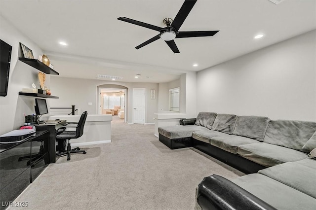 interior space with ceiling fan