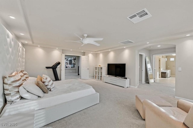 bedroom featuring ceiling fan and light colored carpet