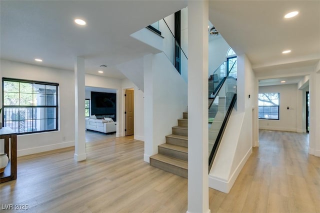 staircase with wood-type flooring