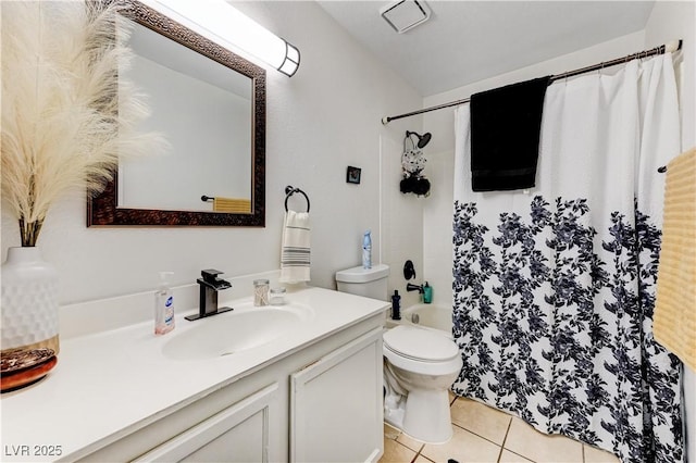 full bathroom with tile patterned flooring, vanity, toilet, and shower / bath combo with shower curtain