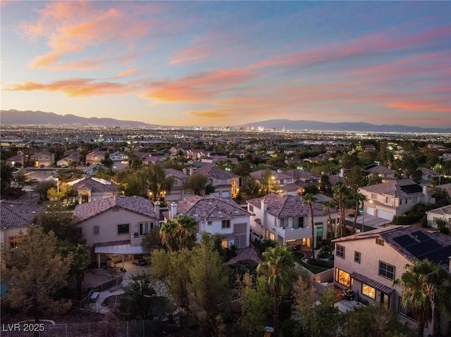 aerial view at dusk with a mountain view