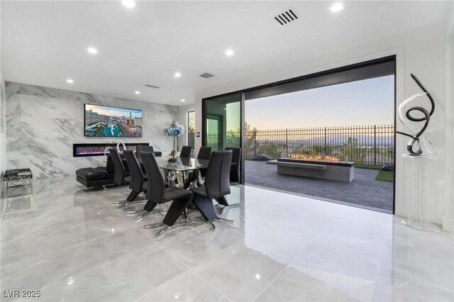 dining room featuring expansive windows