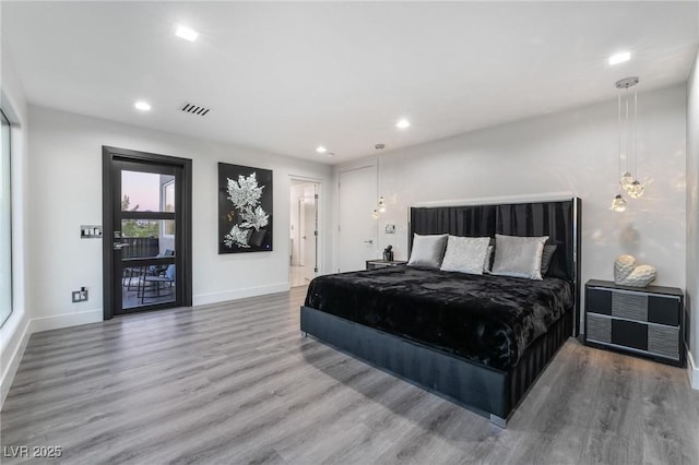 bedroom featuring wood-type flooring