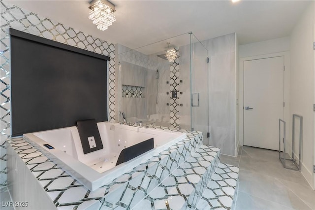 bathroom with independent shower and bath and a chandelier