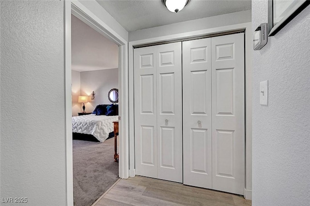 hallway featuring light hardwood / wood-style floors