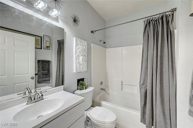 full bathroom with shower / bath combination with curtain, vanity, and toilet