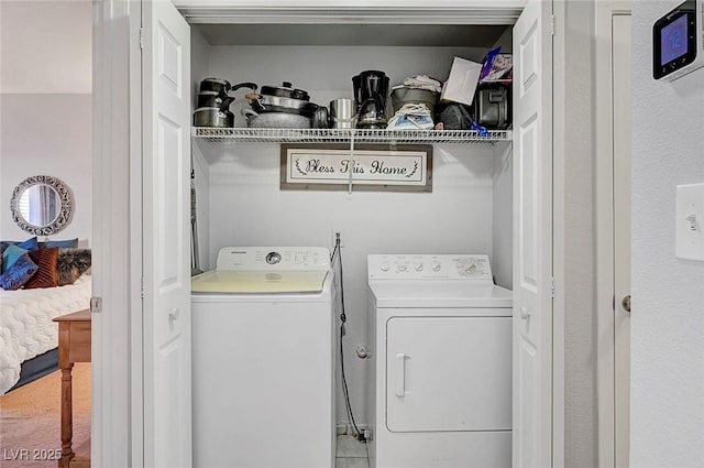 laundry area with independent washer and dryer