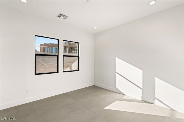 view of tiled spare room