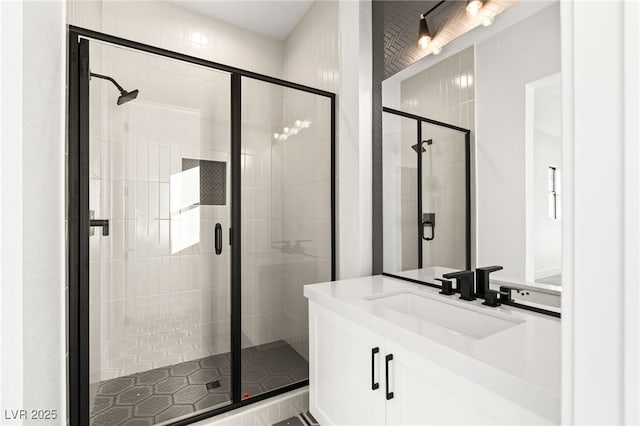 bathroom with vanity and walk in shower