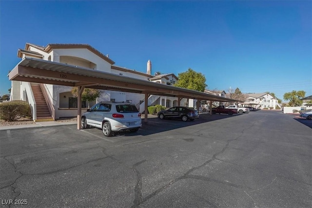 view of parking featuring a carport