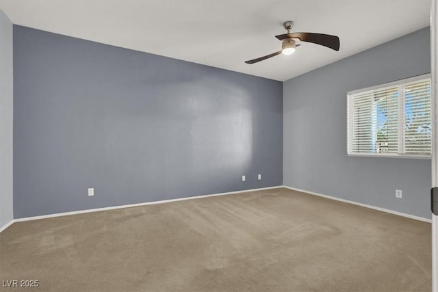 empty room with carpet floors and ceiling fan