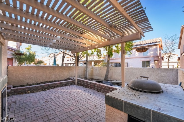 patio terrace at dusk with a pergola