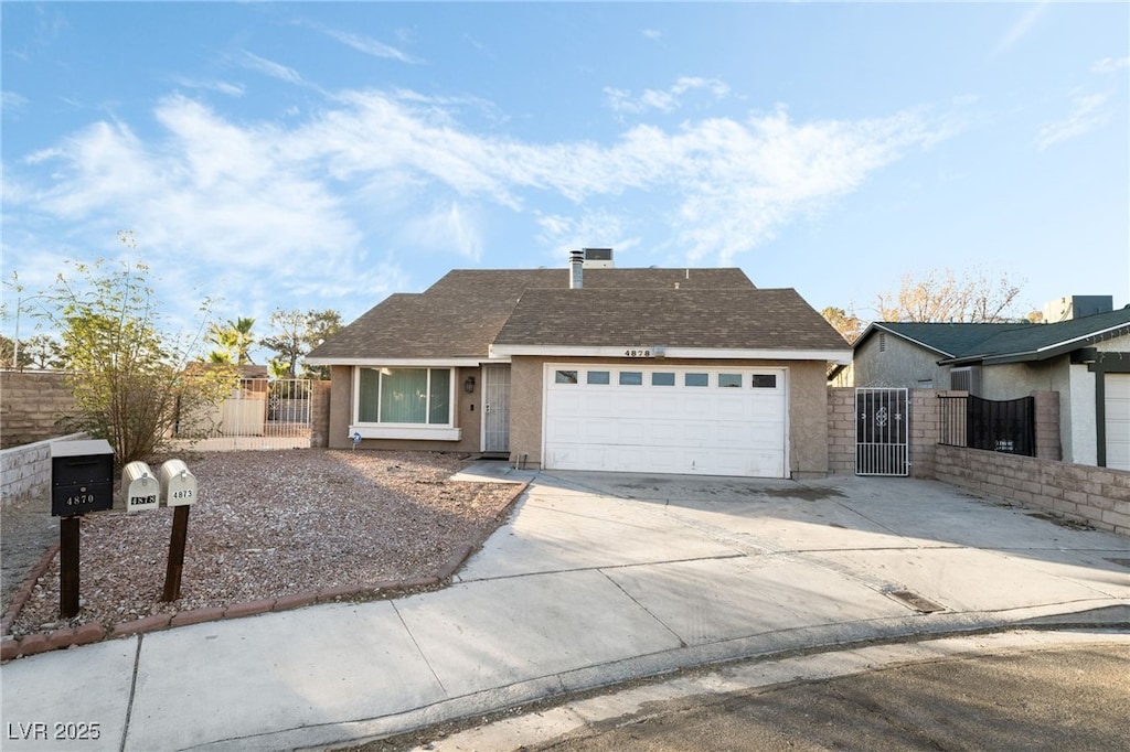 ranch-style house featuring a garage