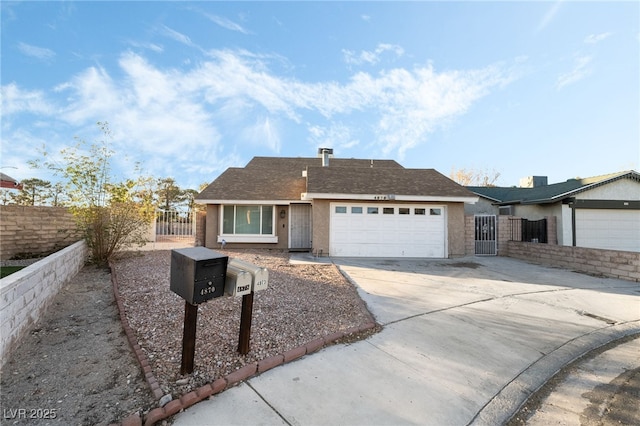 ranch-style home featuring a garage