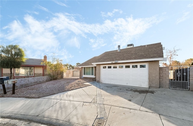 single story home with a garage