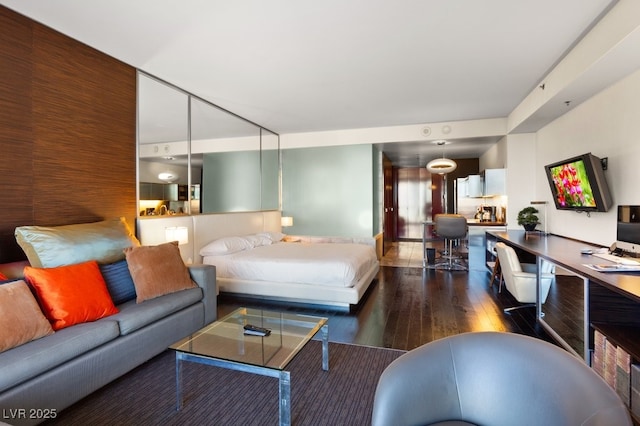 bedroom featuring dark hardwood / wood-style floors