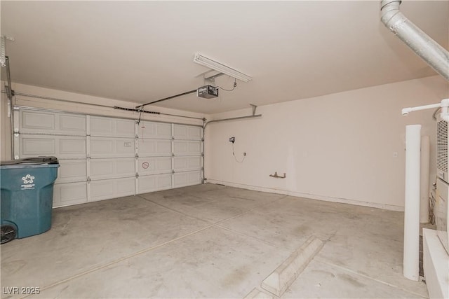 garage featuring a garage door opener